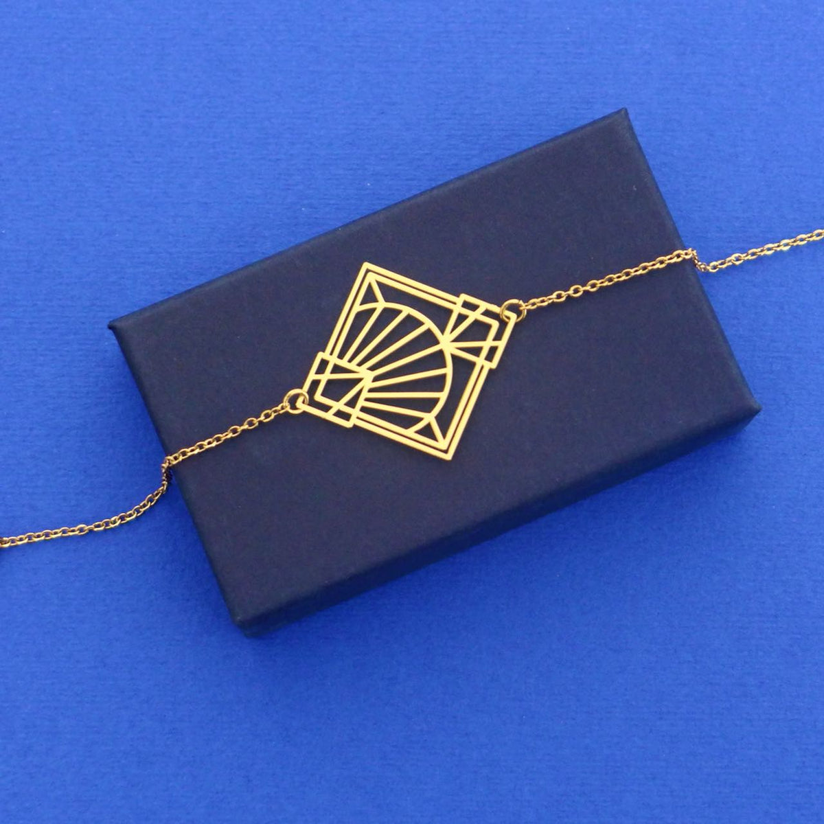 Bracelet graphique Art Déco doré contemporain