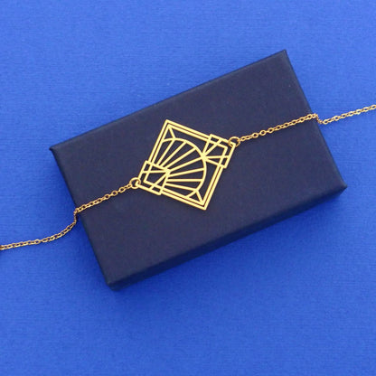 Bracelet graphique Art Déco doré contemporain