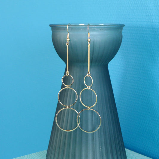 Longues boucles d'oreilles géométriques cascade de 3 anneaux dorés