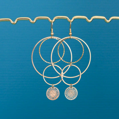 Boucles d'oreilles graphiques cascade de cercles dorés