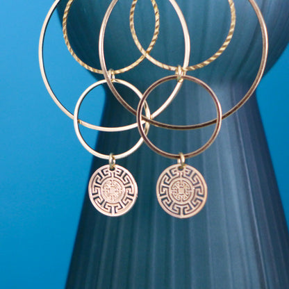 Boucles d'oreilles graphiques cascade de cercles dorés